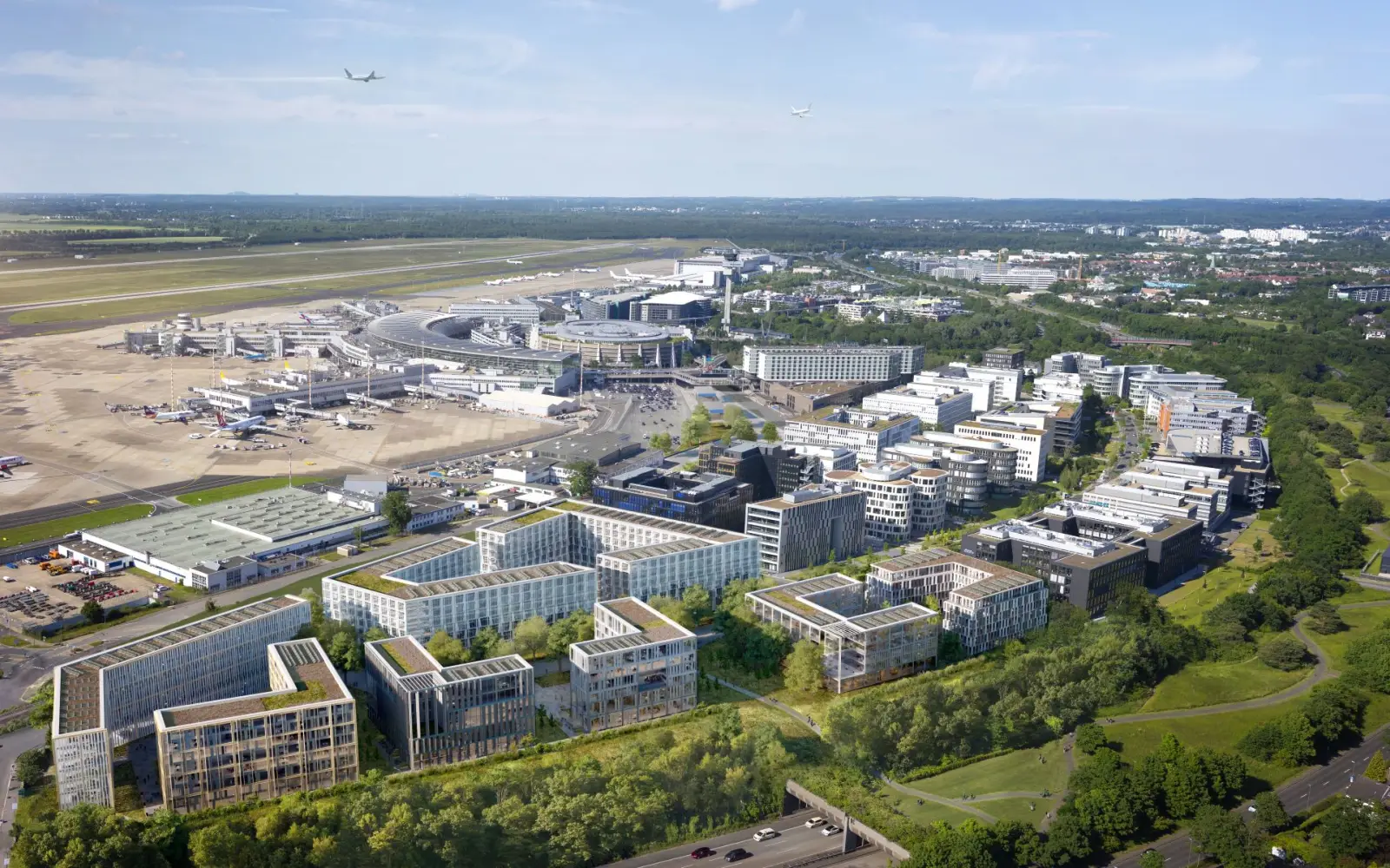Blick auf den Flughafen von Südost. Im Vordergrund der dritte Bauabschnitt der Airport City als Visualisierung. Quelle: Flughafen Düsseldorf GmbH